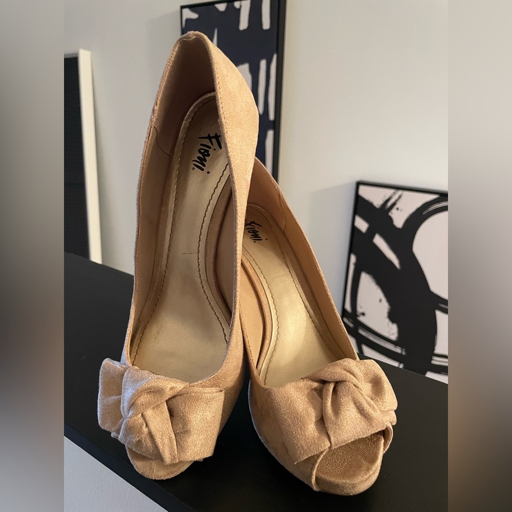 Suede material peep toe heels.
